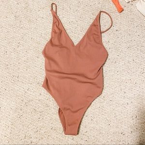 Mauve One Piece Swimsuit. Ribbed.